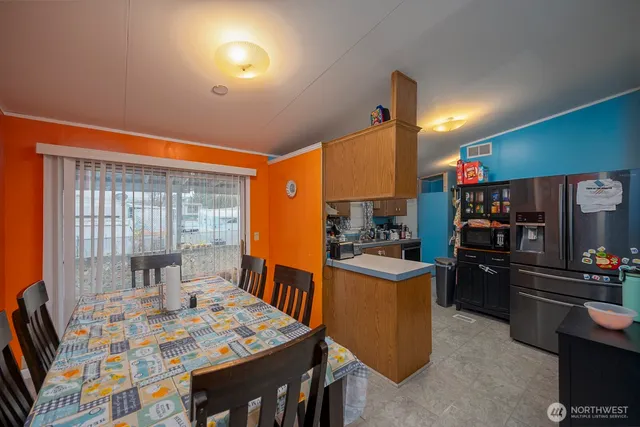 a view of a livingroom with furniture and window