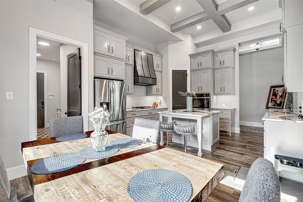 13924 East Riviera Drive Fort Worth, TX 76028 - Photo 14 of 38 a large kitchen with sink refrigerator and cabinets