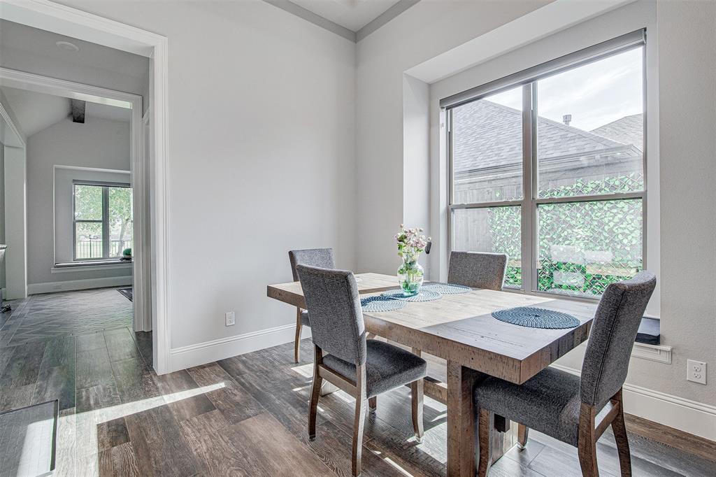 13924 East Riviera Drive Fort Worth, TX 76028 - Photo 15 of 38 a view of a dining room with furniture window and wooden floor