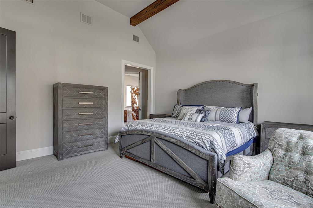 13924 East Riviera Drive Fort Worth, TX 76028 - Photo 18 of 38 a bed room with a bed and a closet