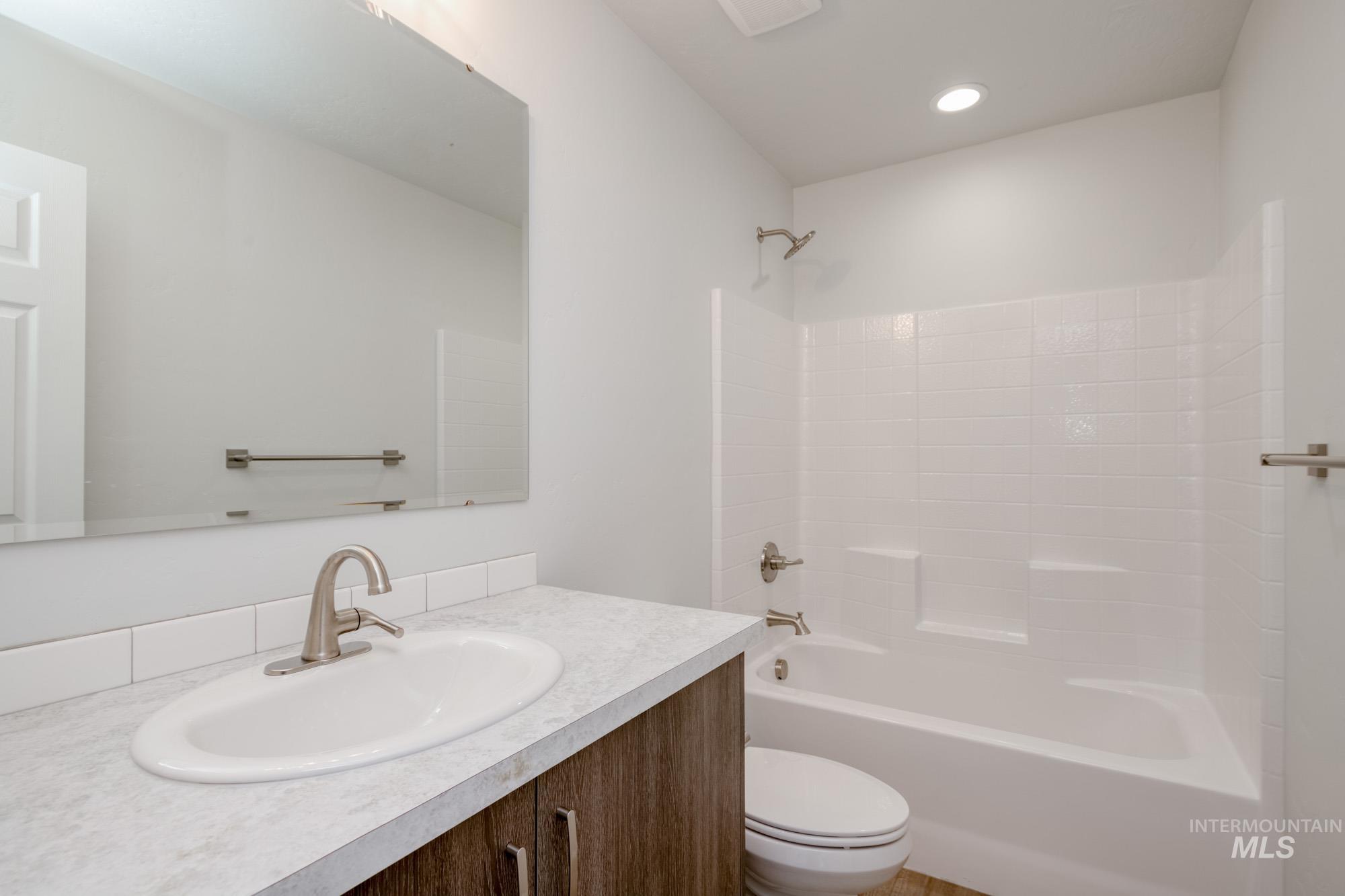 3150 South Maple Rnch Way Nampa, ID 83686 - Photo 14 of 22 Bathroom featuring shower / bathtub combination and vanity