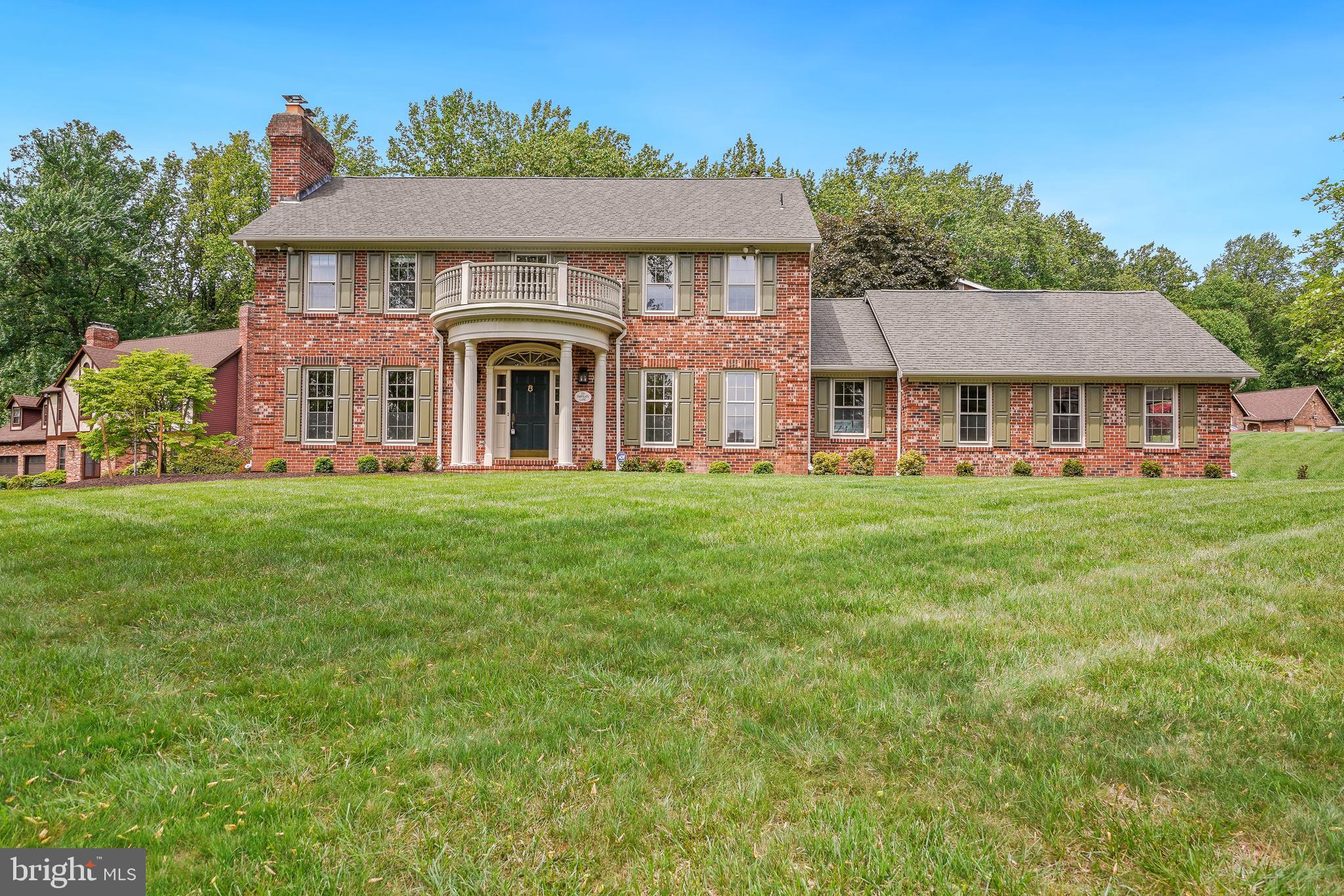 121 Farmgate Lane Silver Spring, MD 20905 - Photo 2 of 51 a front view of a house with a garden