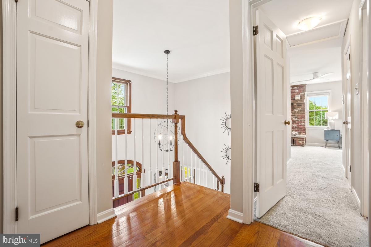 121 Farmgate Lane Silver Spring, MD 20905 - Photo 27 of 51 a view of a hallway with wooden floor and entryway