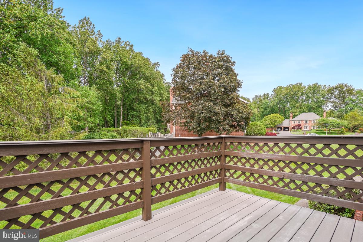 121 Farmgate Lane Silver Spring, MD 20905 - Photo 34 of 51 a view of wooden balcony with furniture