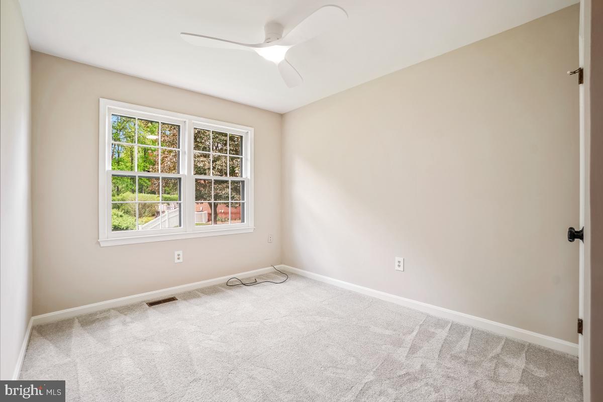 121 Farmgate Lane Silver Spring, MD 20905 - Photo 38 of 51 an empty room with a window