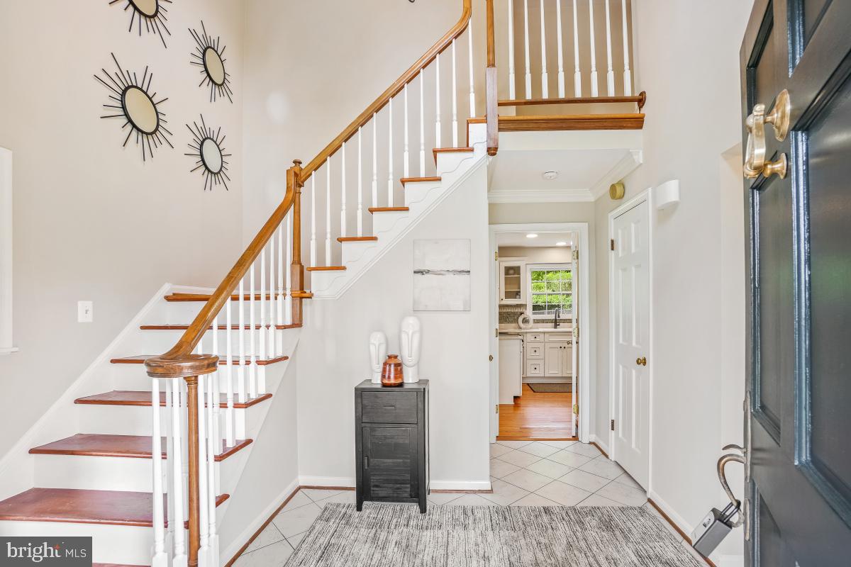 121 Farmgate Lane Silver Spring, MD 20905 - Photo 6 of 51 a view of entryway and hall with wooden floor
