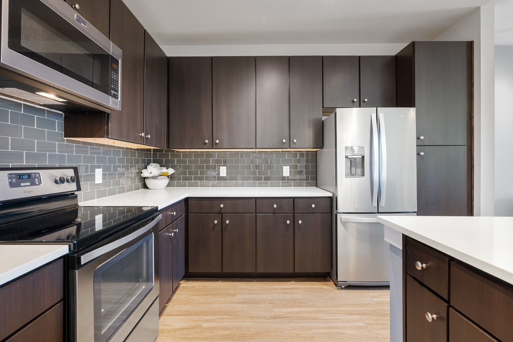 1900 Barton Springs Road, Unit 5009 Austin, TX 78704 - Photo 10 of 35 A well-appointed kitchen features stainless steel appliances and ample cabinetry.