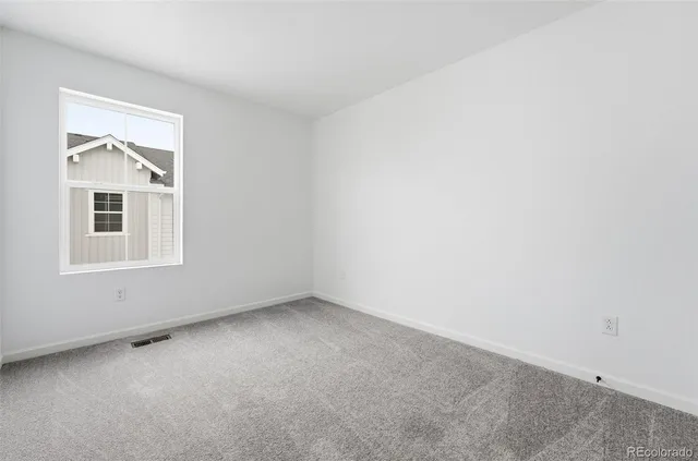 a bathroom with a sink a toilet and vanity