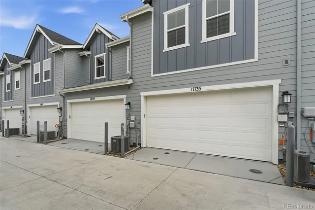 an aerial view of a house with outdoor space