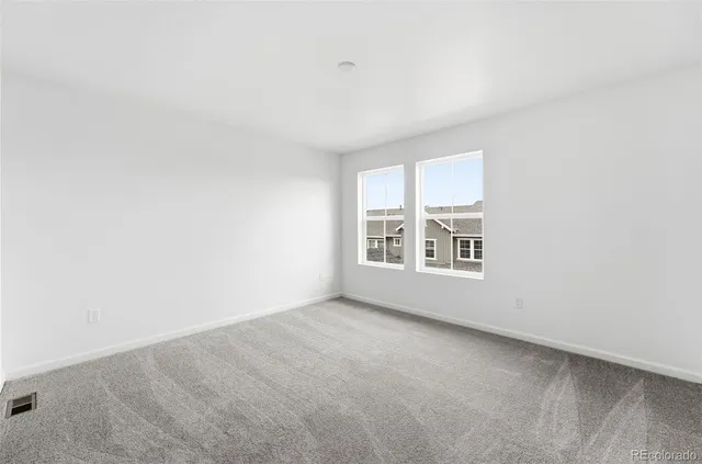 a bathroom with a sink shower and a mirror
