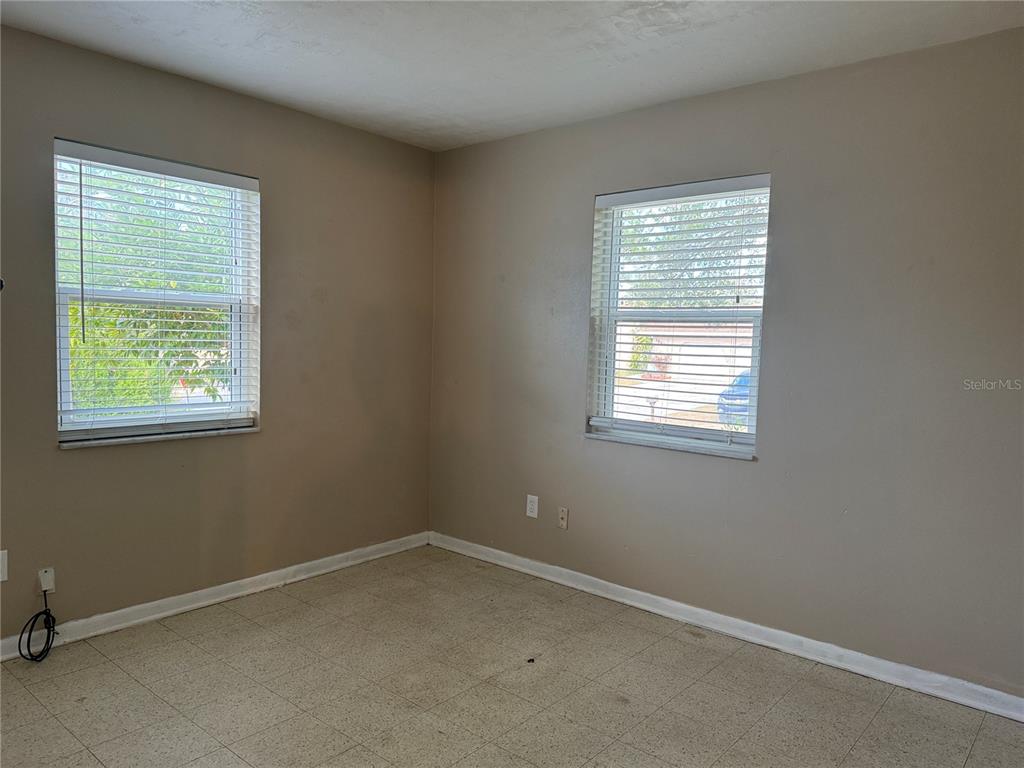 6315 Treehaven Drive Spring Hill, FL 34606 - Photo 18 of 21 an empty room with a window