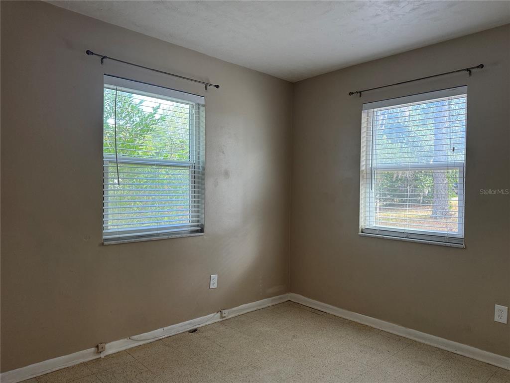 6315 Treehaven Drive Spring Hill, FL 34606 - Photo 20 of 21 an empty room with a window
