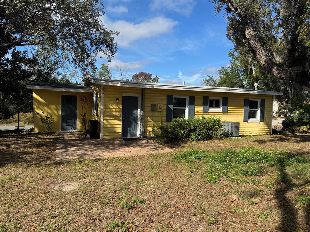 6315 Treehaven Drive Spring Hill, FL 34606 - Photo 6 of 21 a front view of house with yard and trees around