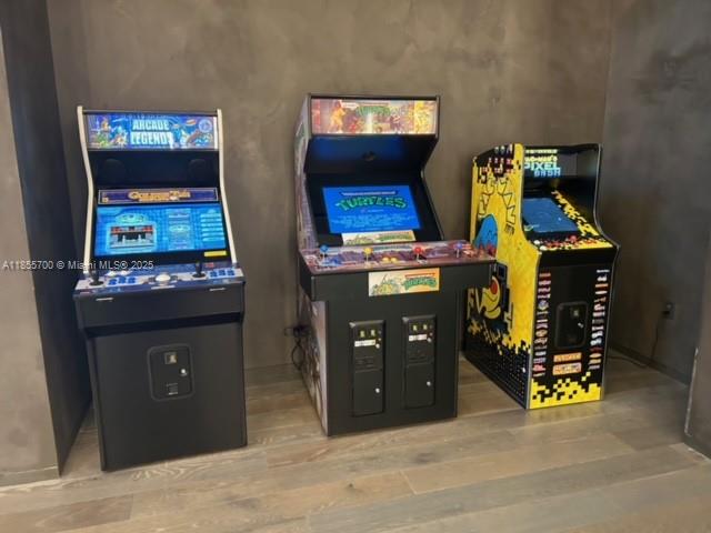 480 Northeast 31st Street, Unit 905 Miami, FL 33137 - Photo 15 of 15 a bed room with a bed and a television