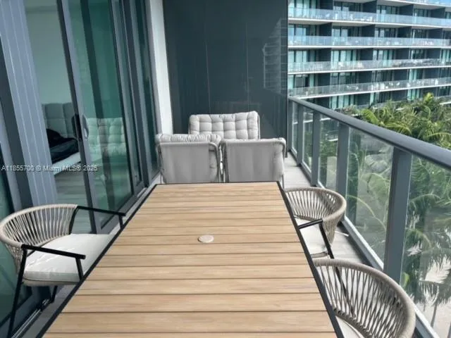 a view of a balcony with an outdoor space