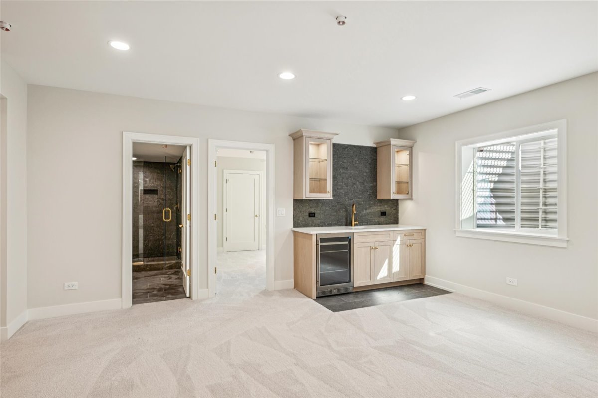 1068 Livingston (lot 1) Avenue Highland Park, IL 60035 - Photo 16 of 33 a large white kitchen with granite countertop a stove and a sink