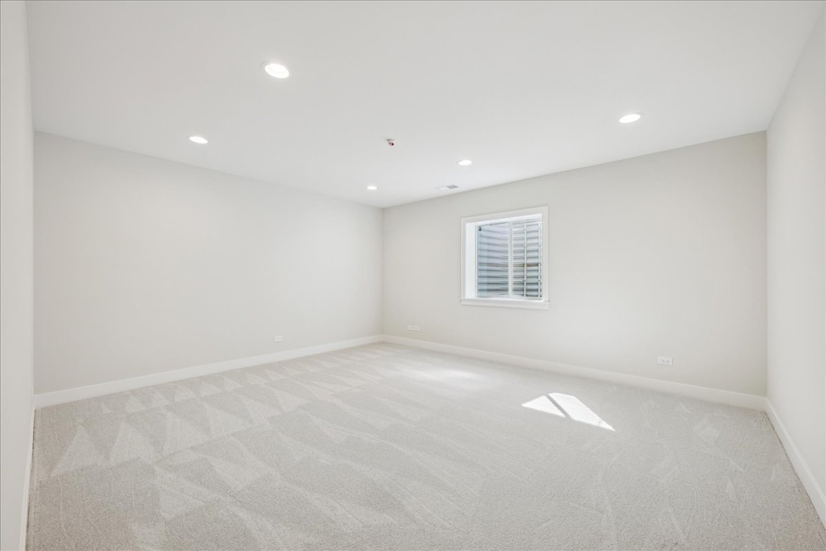 1068 Livingston (lot 1) Avenue Highland Park, IL 60035 - Photo 18 of 33 an empty room with windows