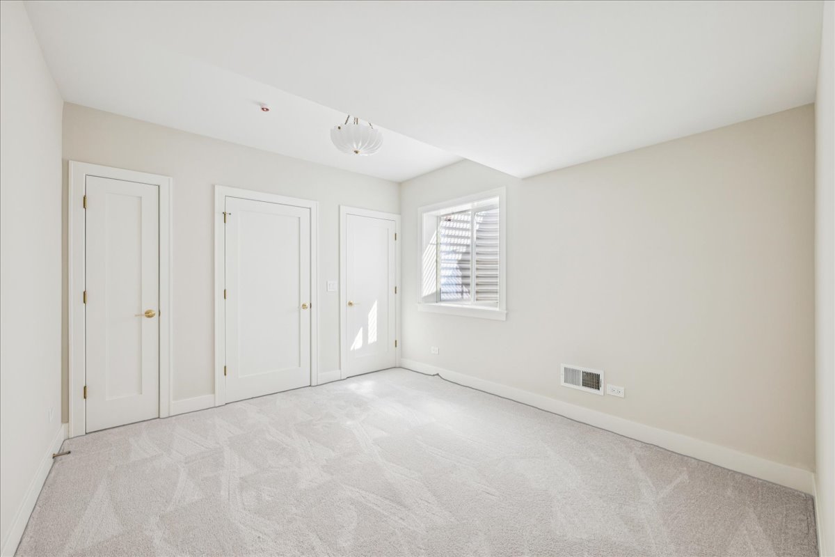 1068 Livingston (lot 1) Avenue Highland Park, IL 60035 - Photo 19 of 33 an empty room with windows