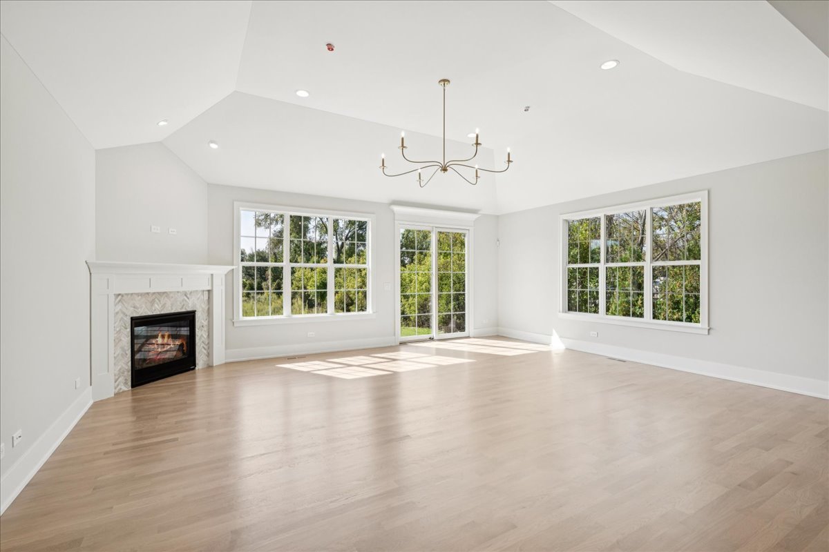 1068 Livingston (lot 1) Avenue Highland Park, IL 60035 - Photo 8 of 33 a view of an empty room with a fireplace and a window