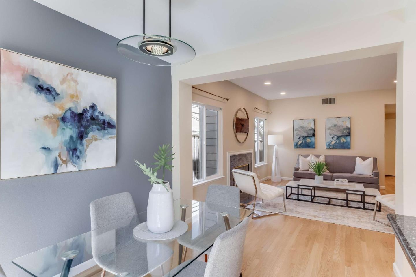 11627 Cedar Spring Court Cupertino, CA 95014 - Photo 14 of 54 a living room with furniture and a chandelier