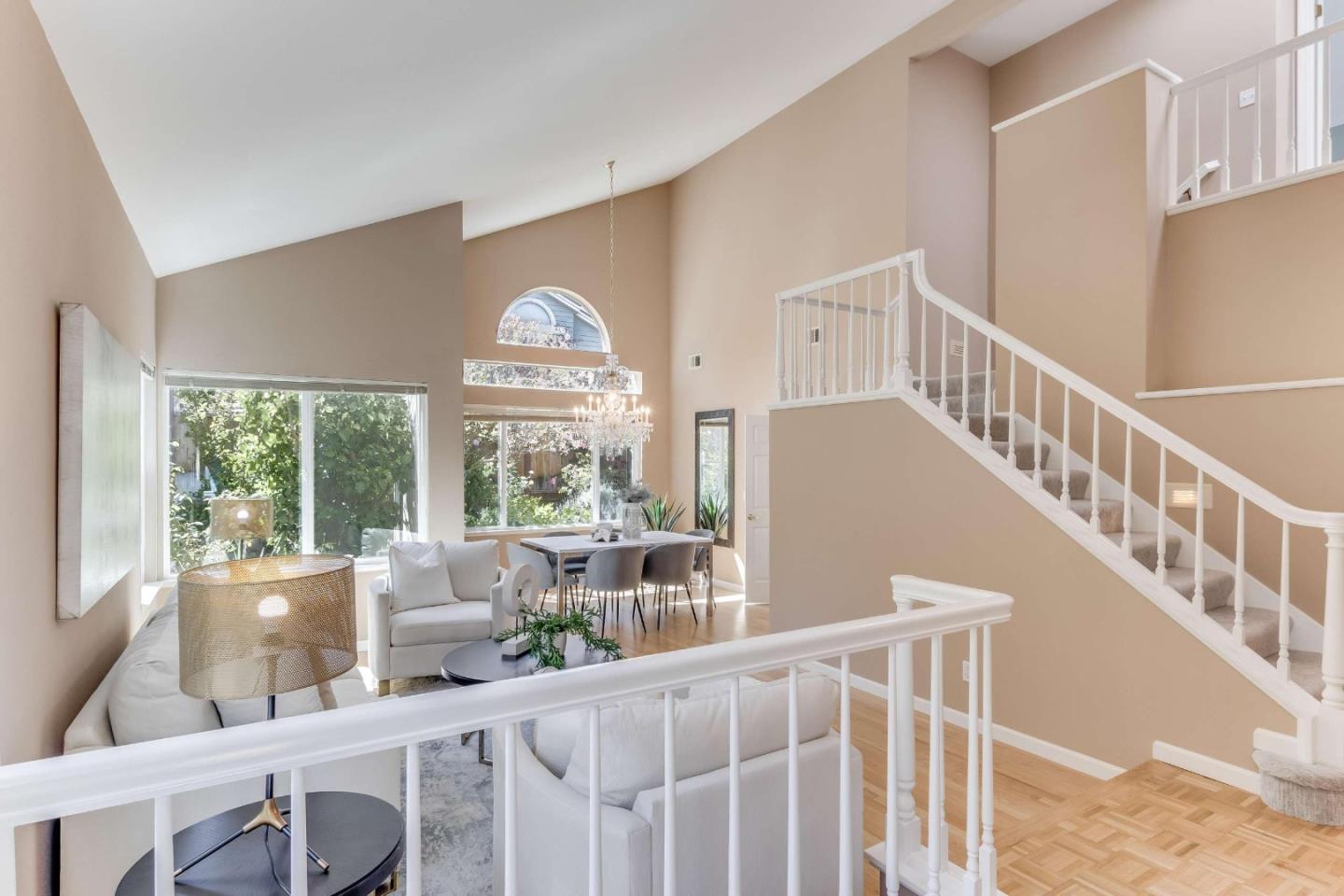 11627 Cedar Spring Court Cupertino, CA 95014 - Photo 2 of 54 a view of an empty room with wooden floor and windows