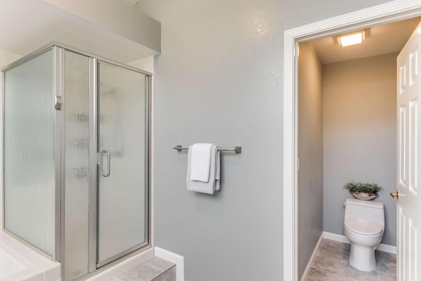 11627 Cedar Spring Court Cupertino, CA 95014 - Photo 21 of 54 a bathroom with a shower