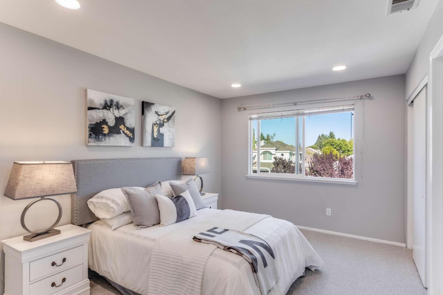 11627 Cedar Spring Court Cupertino, CA 95014 - Photo 26 of 54 a bedroom with bed and a window