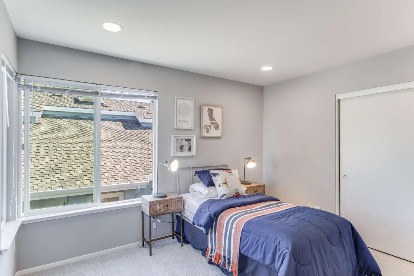 11627 Cedar Spring Court Cupertino, CA 95014 - Photo 28 of 54 a bedroom with a bed and a window