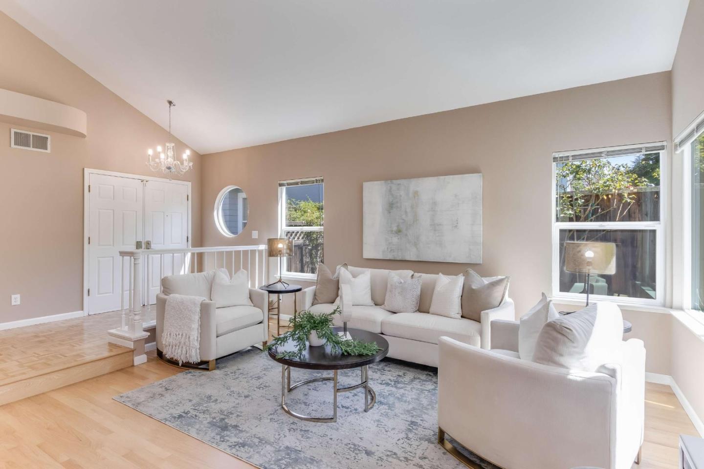 11627 Cedar Spring Court Cupertino, CA 95014 - Photo 3 of 54 a living room with furniture and a large window