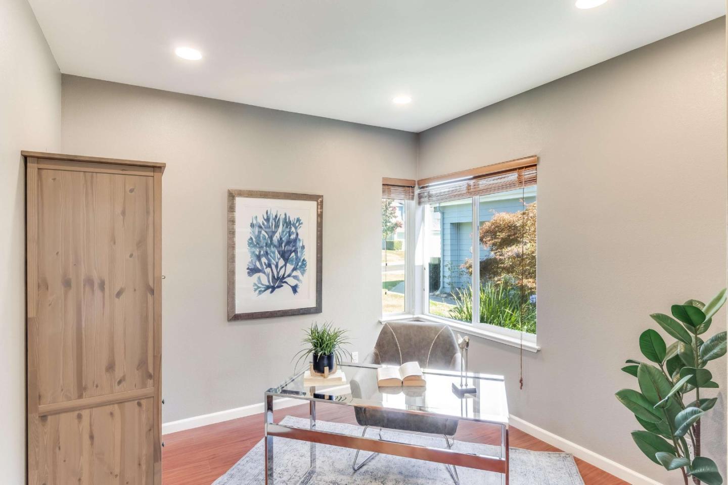 11627 Cedar Spring Court Cupertino, CA 95014 - Photo 33 of 54 a living room with furniture and a potted plant
