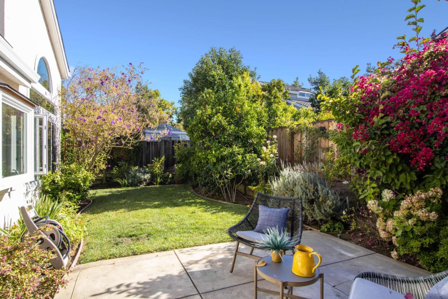 11627 Cedar Spring Court Cupertino, CA 95014 - Photo 38 of 54 a view of a backyard with plants and trees