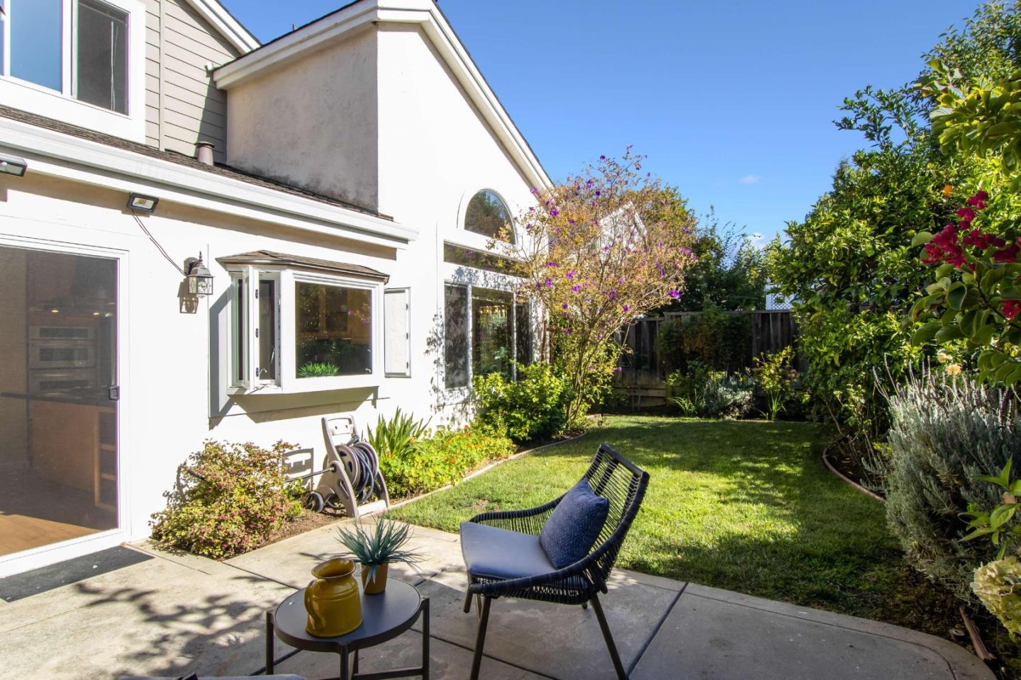11627 Cedar Spring Court Cupertino, CA 95014 - Photo 39 of 54 a view of a house with backyard sitting area and garden