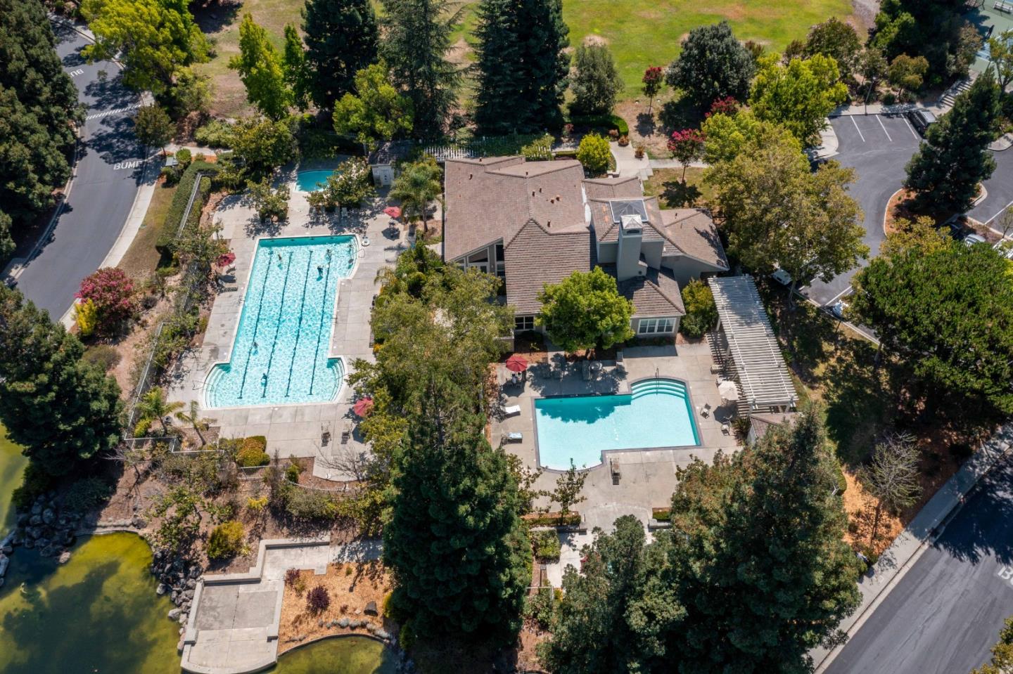 11627 Cedar Spring Court Cupertino, CA 95014 - Photo 46 of 54 an aerial view of a house with a yard and lake view