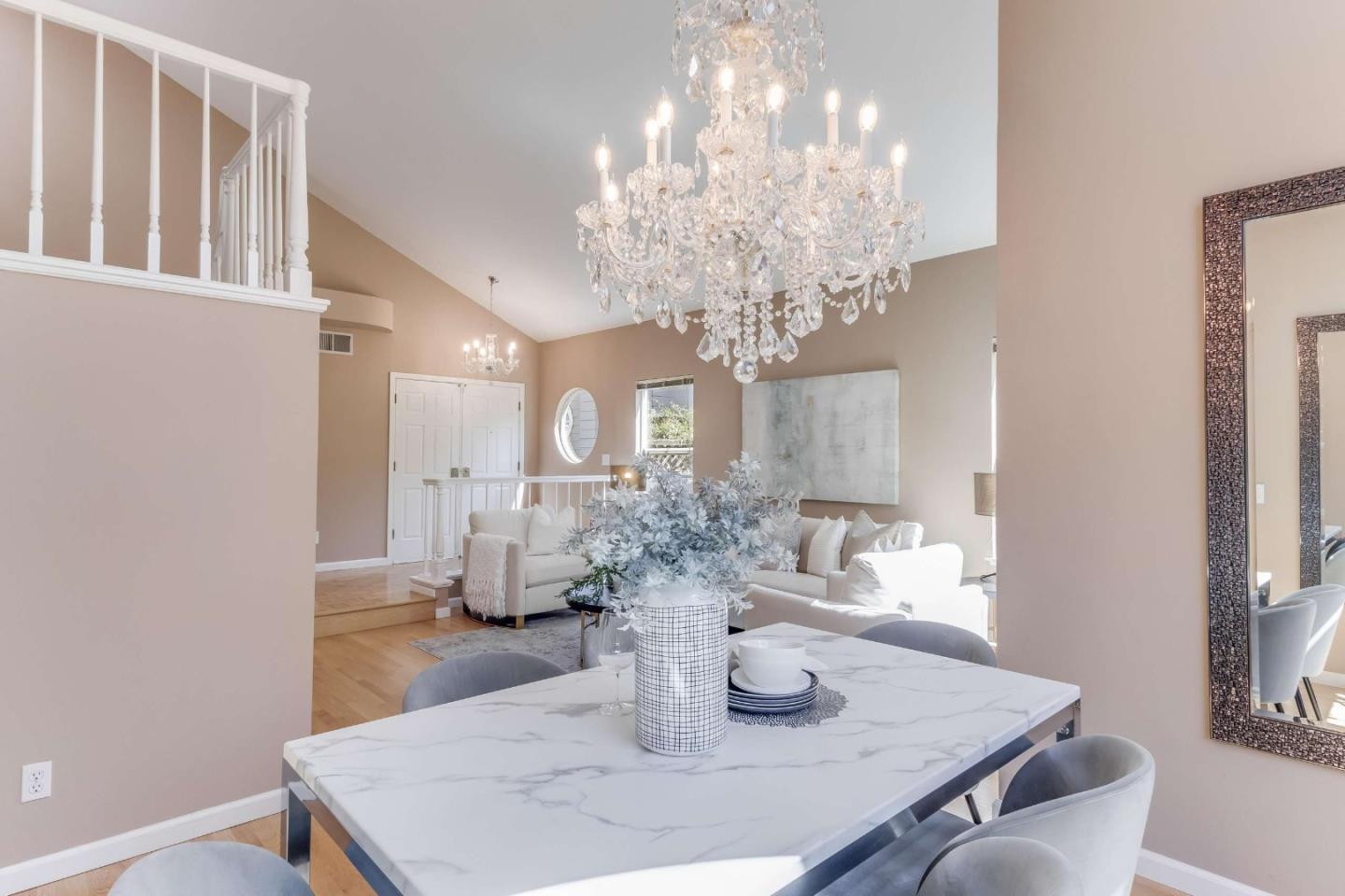 11627 Cedar Spring Court Cupertino, CA 95014 - Photo 7 of 54 a view of a dining room with furniture and chandelier