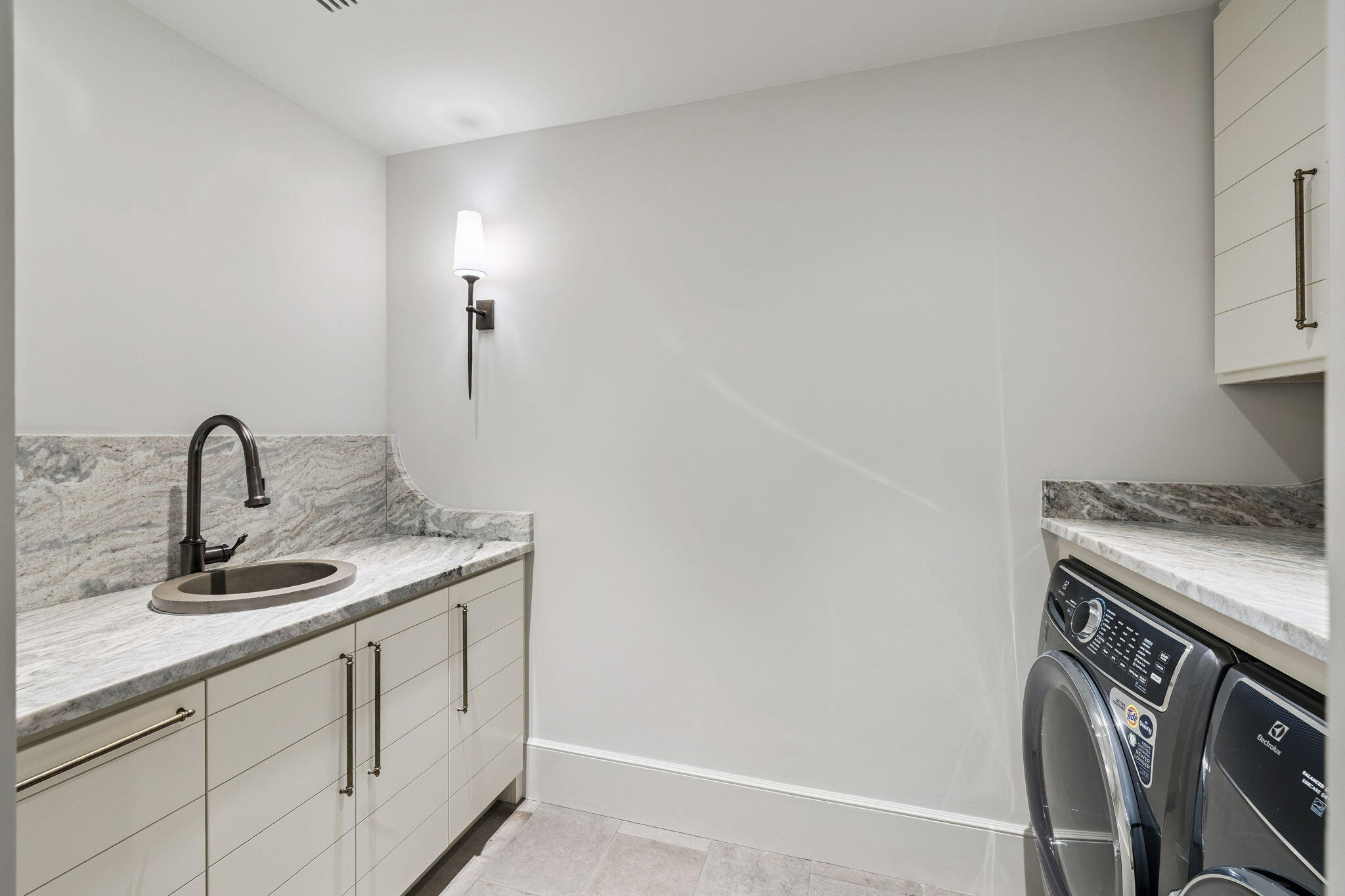 613 Eden Drive Point Washington, FL 32459 - Photo 22 of 81 a utility room with sink dryer and washer