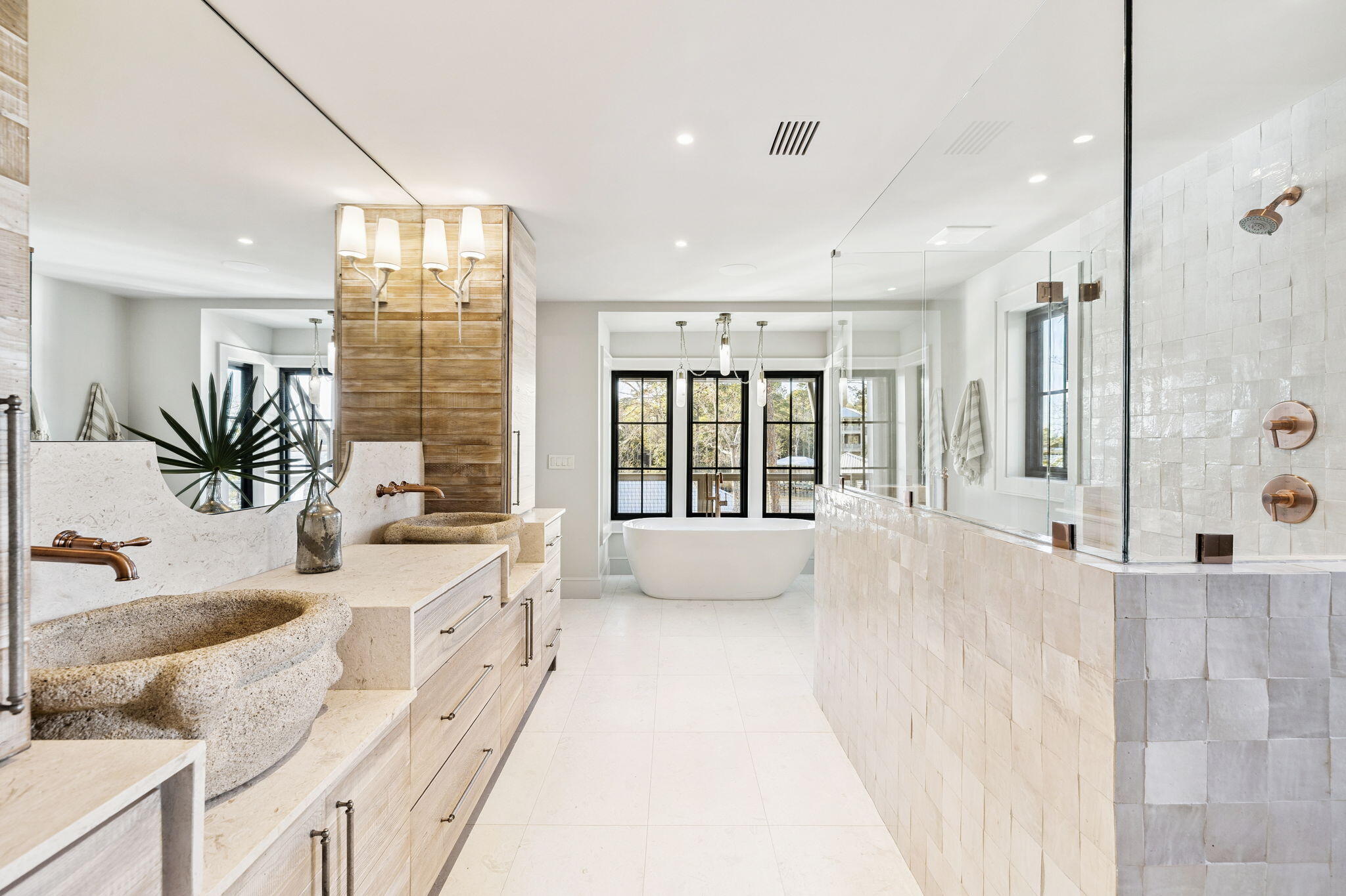613 Eden Drive Point Washington, FL 32459 - Photo 37 of 81 a large white bathroom with a large tub shower and sink