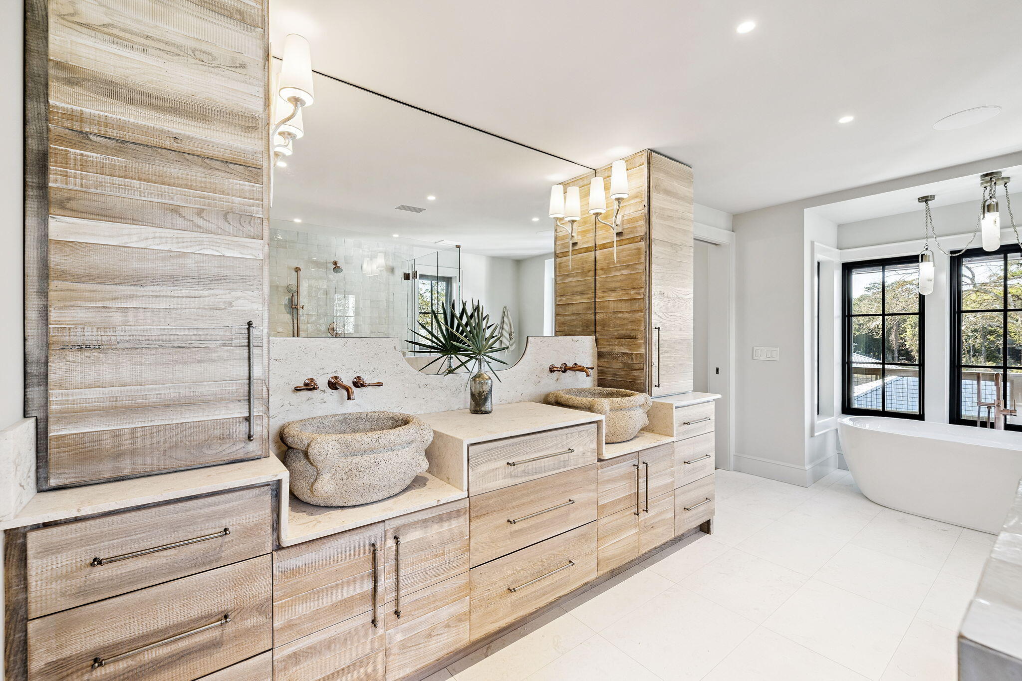 613 Eden Drive Point Washington, FL 32459 - Photo 38 of 81 a spacious bathroom with a double vanity sink a mirror and a shower