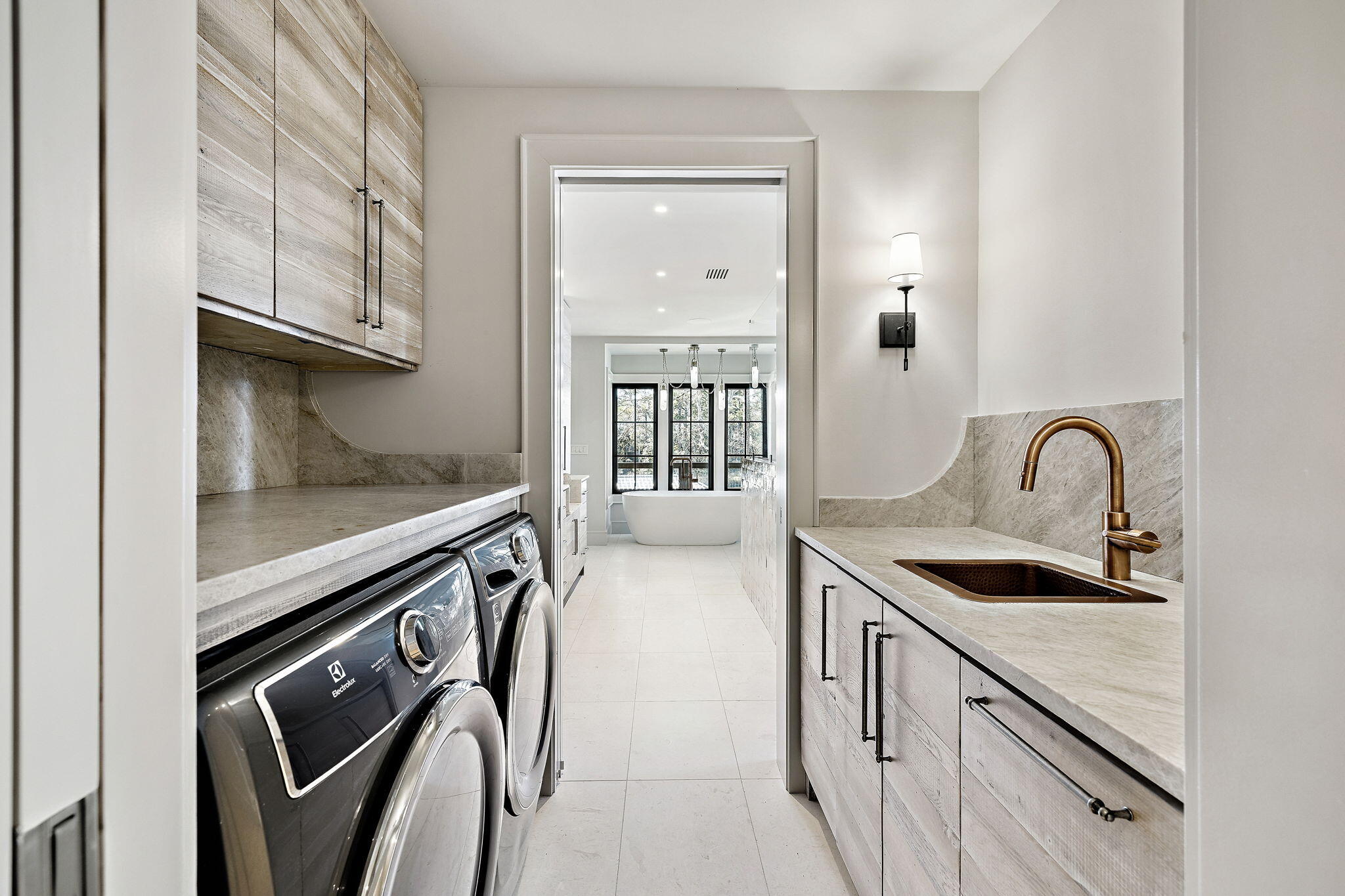 613 Eden Drive Point Washington, FL 32459 - Photo 41 of 81 a kitchen with stainless steel appliances granite countertop a sink a stove and a refrigerator