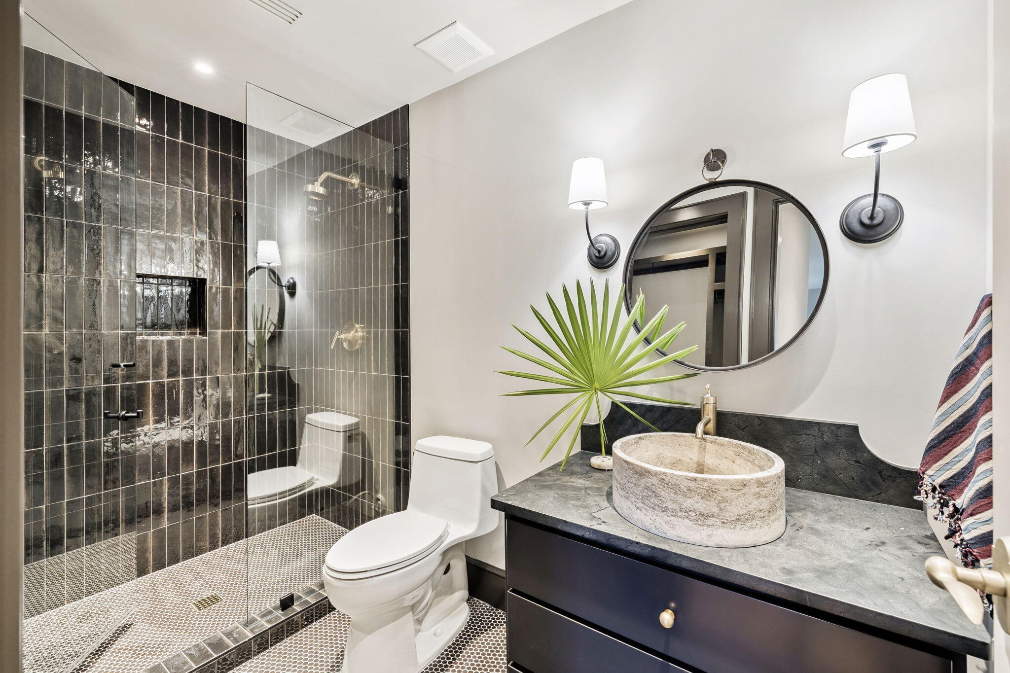 613 Eden Drive Point Washington, FL 32459 - Photo 43 of 81 a bathroom with a granite countertop sink a toilet and shower