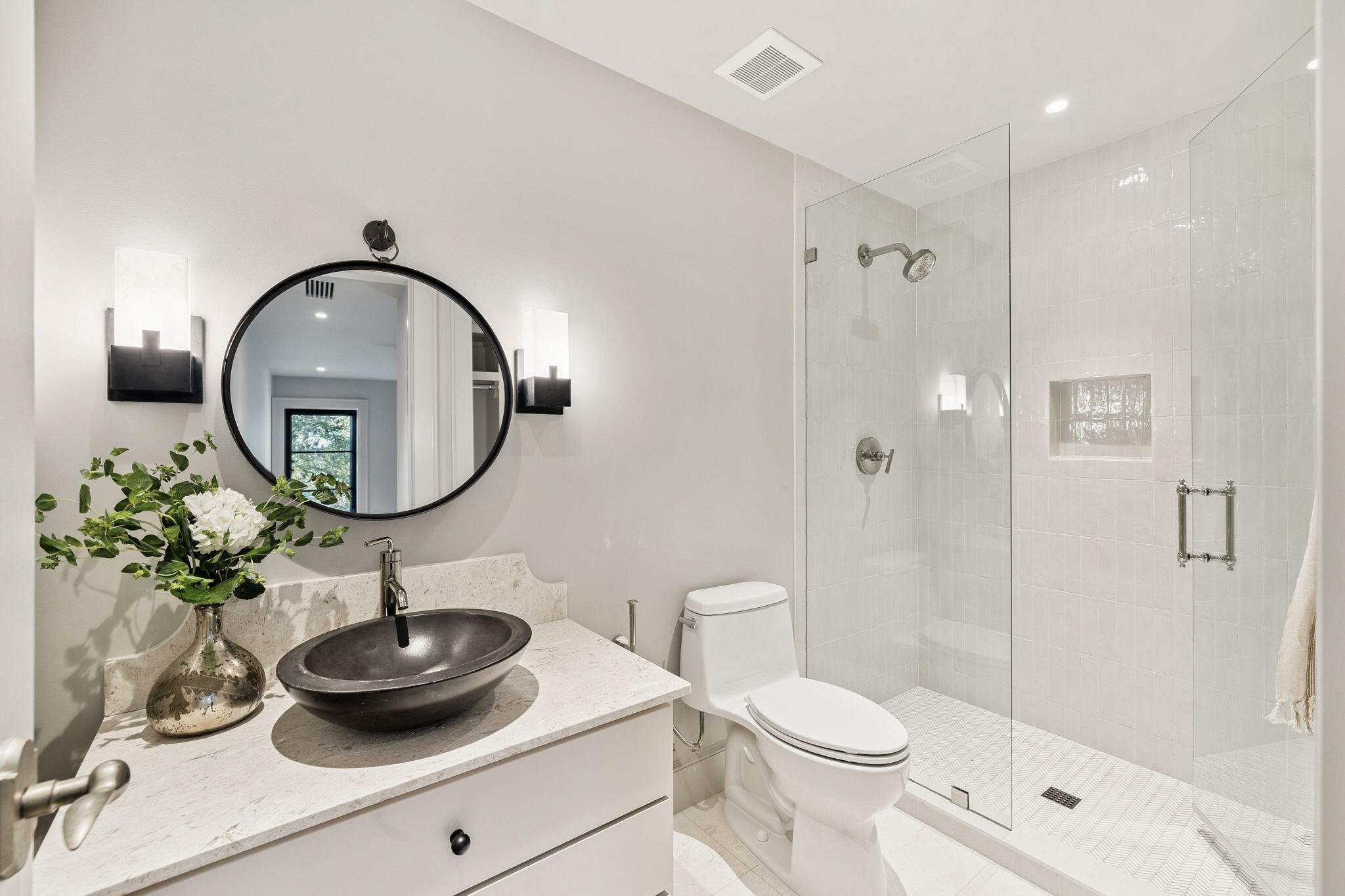 613 Eden Drive Point Washington, FL 32459 - Photo 45 of 81 a bathroom with a toilet a sink and a mirror