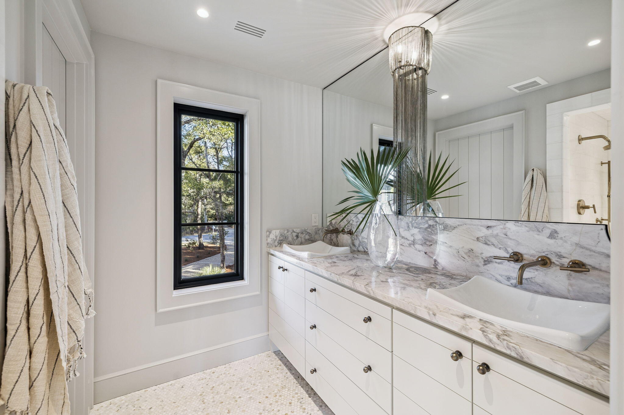 613 Eden Drive Point Washington, FL 32459 - Photo 48 of 81 a bathroom with a granite countertop sink a mirror and a shower
