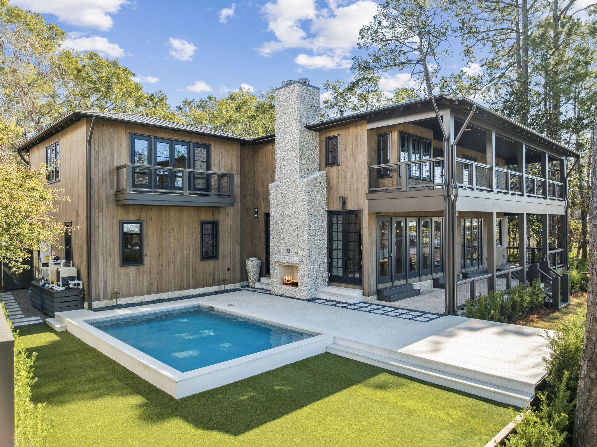 613 Eden Drive Point Washington, FL 32459 - Photo 63 of 81 a view of a house with pool and sitting area