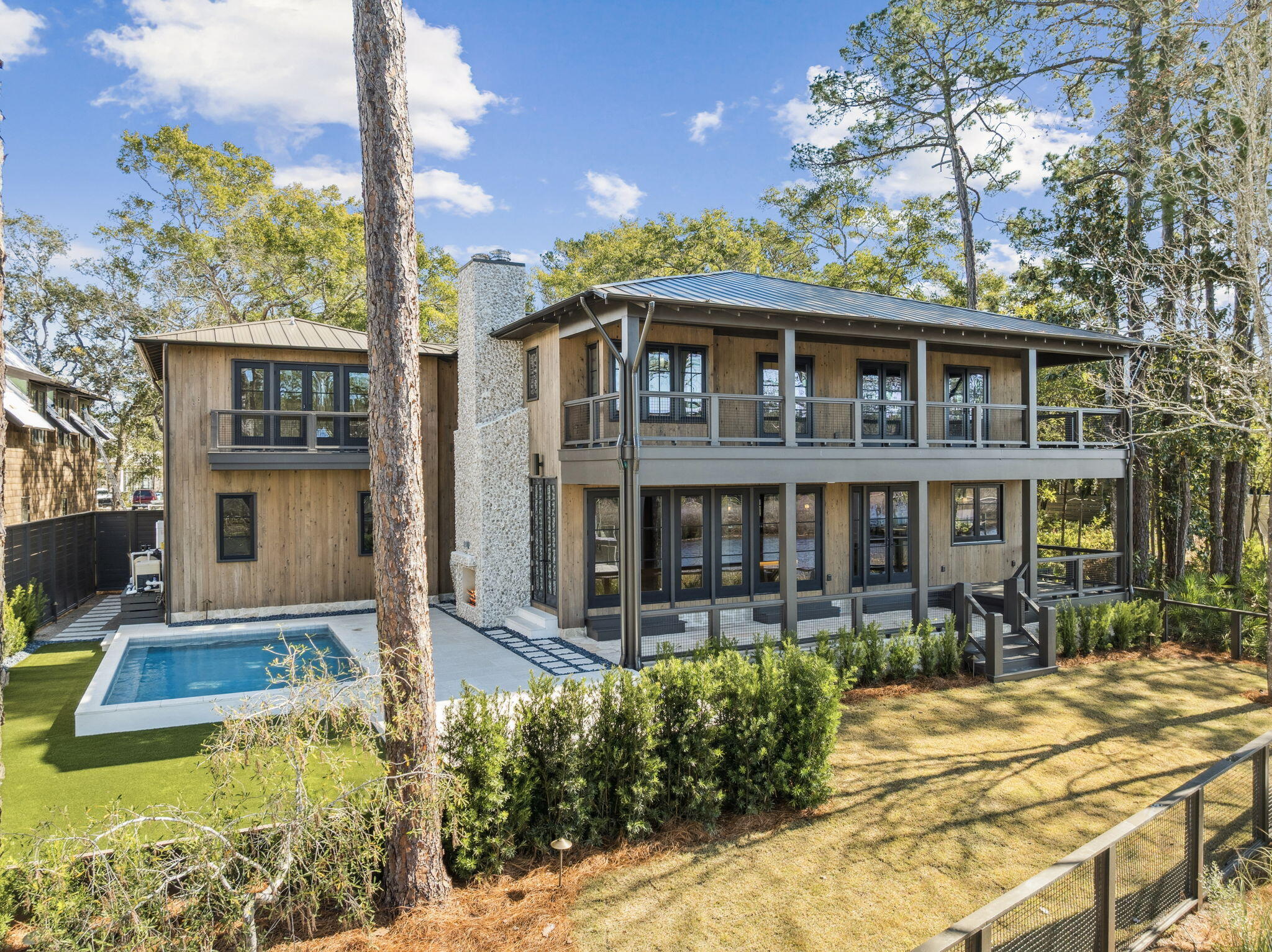 613 Eden Drive Point Washington, FL 32459 - Photo 66 of 81 a view of a house with a swimming pool