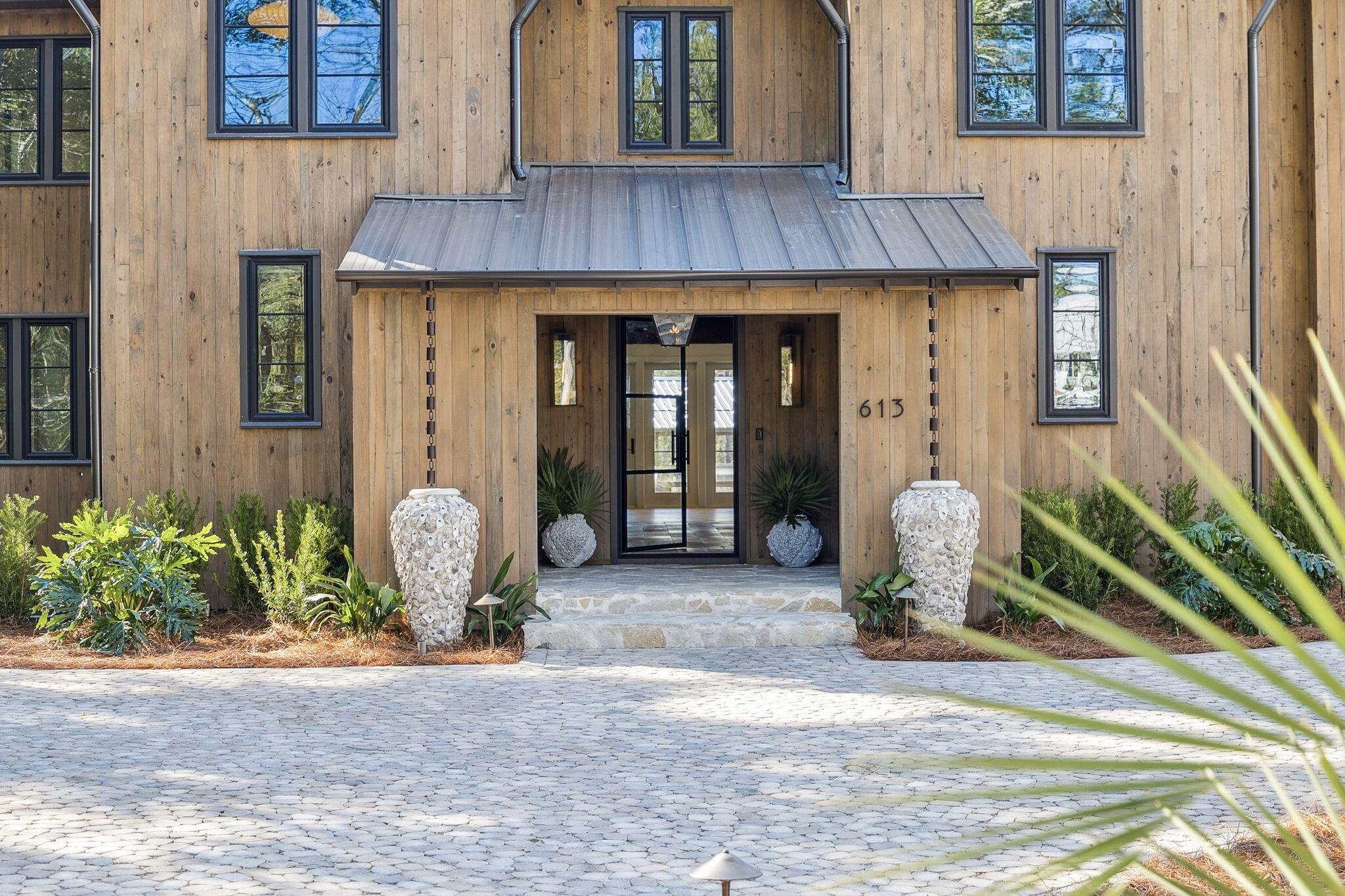 613 Eden Drive Point Washington, FL 32459 - Photo 68 of 81 a view of outdoor space and front view of a house
