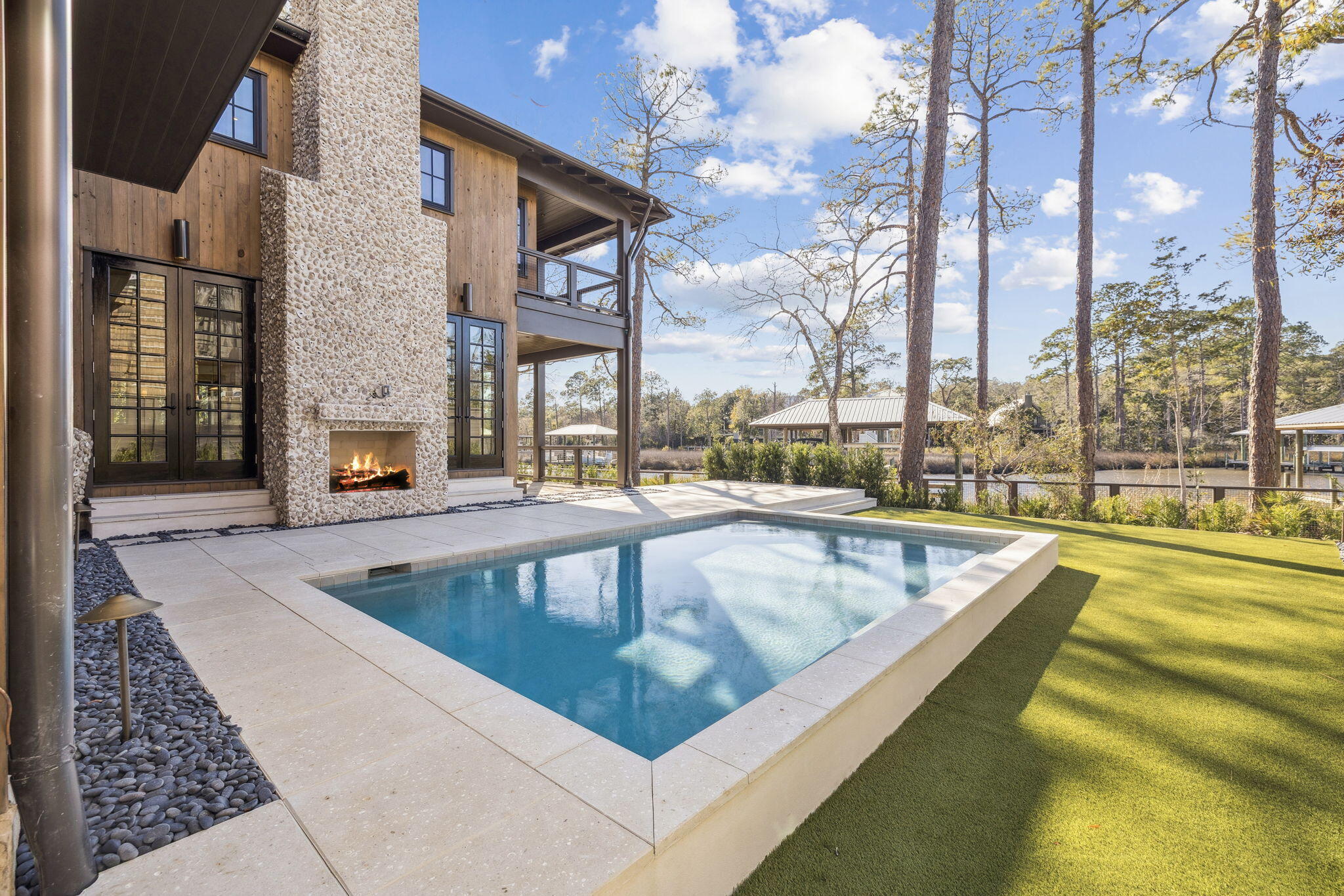 613 Eden Drive Point Washington, FL 32459 - Photo 70 of 81 a view of swimming pool with outdoor seating and city view
