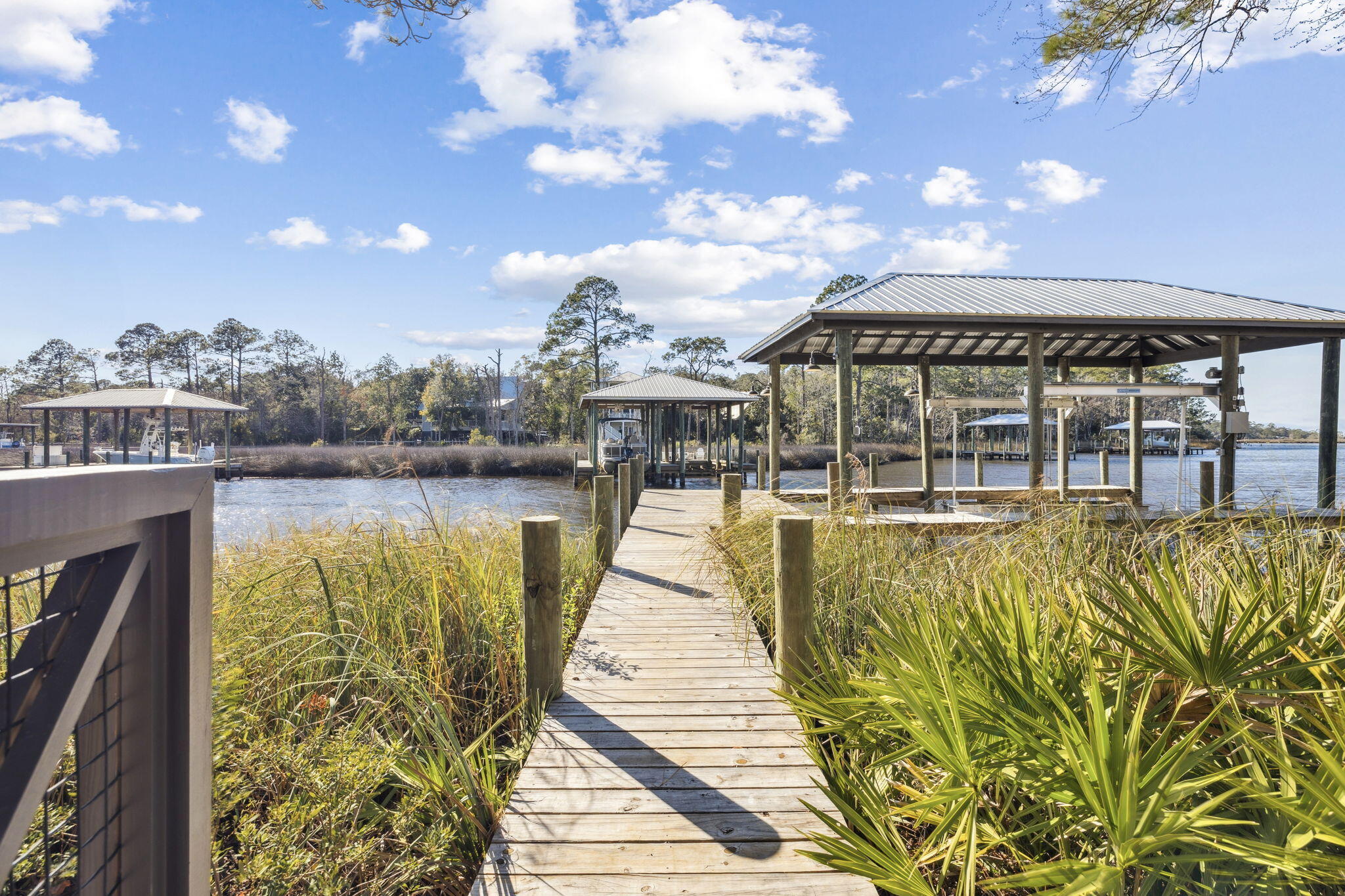 613 Eden Drive Point Washington, FL 32459 - Photo 74 of 81 a view of a swimming pool with an outdoor seating