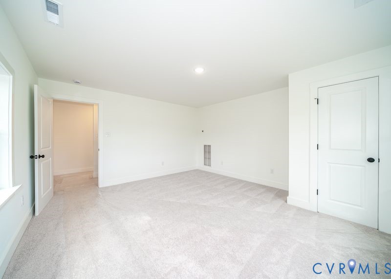 281 Petersburg Road Powhatan, VA 23139 - Photo 26 of 38 Spare room featuring light carpet and recessed lig