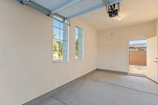 an empty room with windows