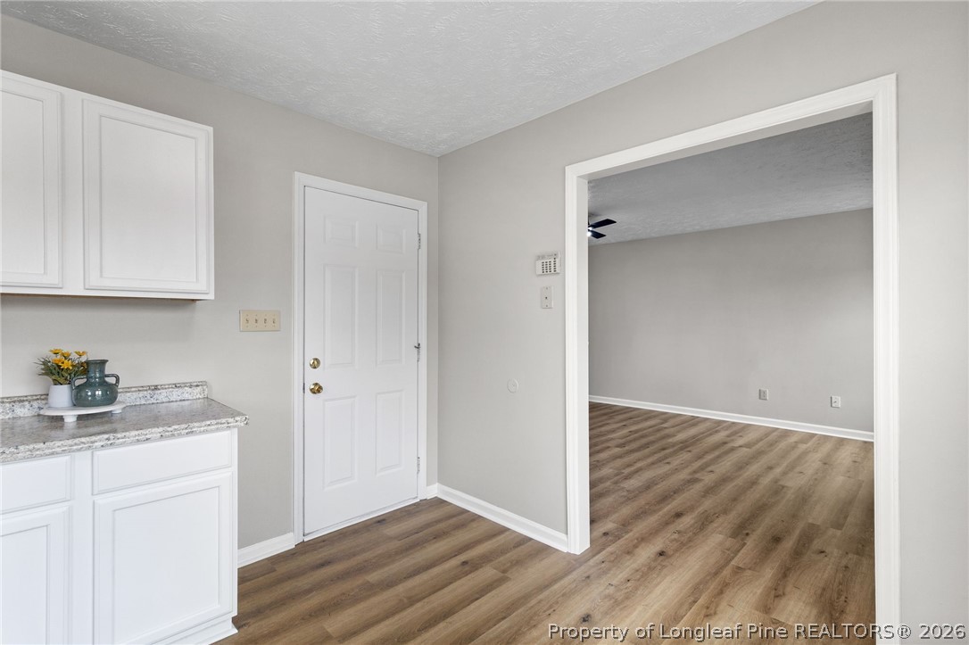 388 Woodwind Drive Spring Lake, NC 28390 - Photo 13 of 31 a view of cabinets and wooden floor