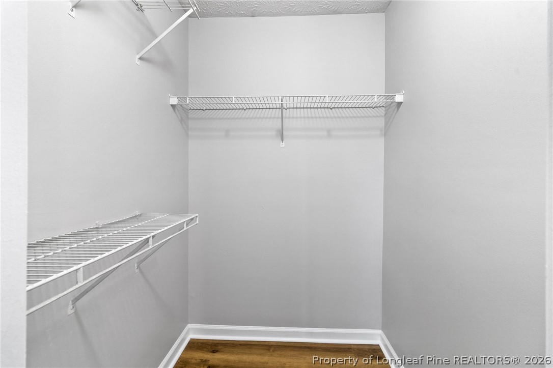 388 Woodwind Drive Spring Lake, NC 28390 - Photo 19 of 31 a view of a room with racks on the wall